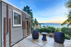 Modern two story panorama house with of Puget Sound view.